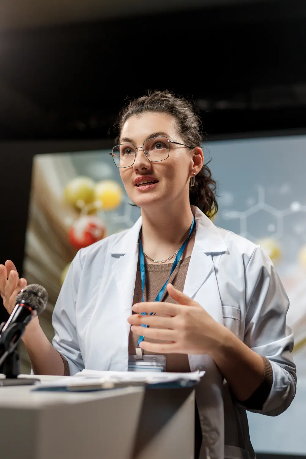 Researcher presenting findings at a conference.