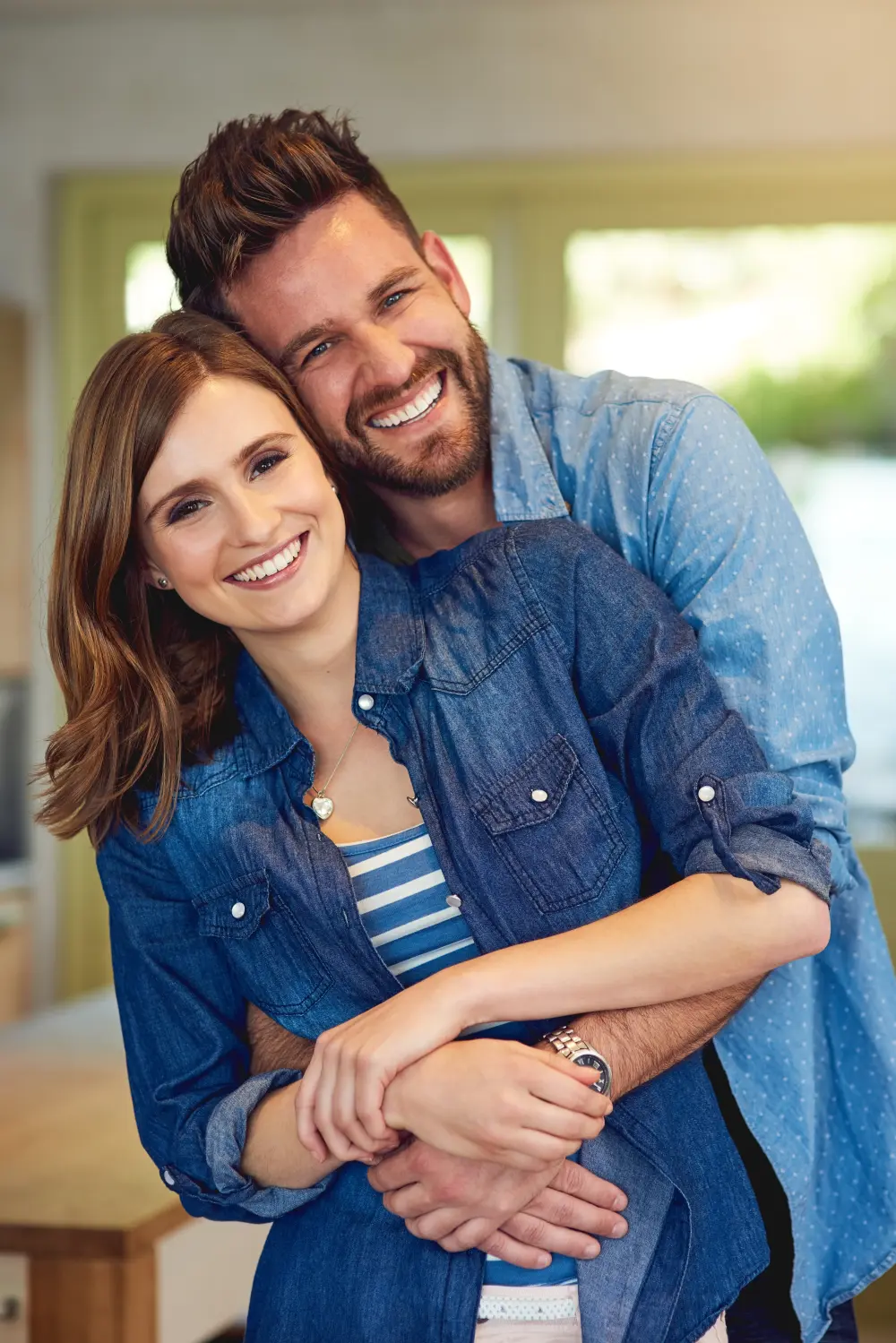 Husband hugging his wife.